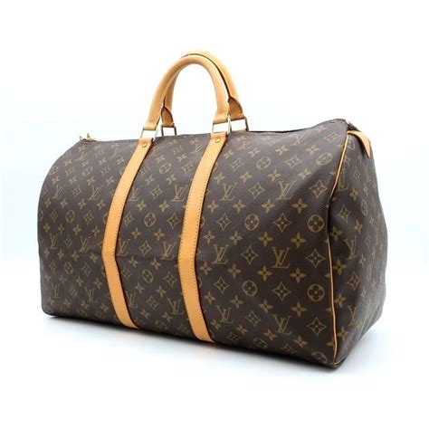 borsa da viaggio lv|Storia Keepall Louis Vuitton, il borsone da viaggio più iconico.